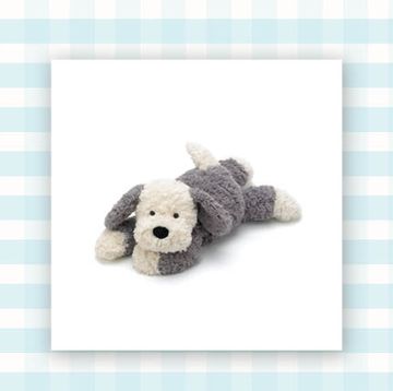 stuffed dog and magnetic connecting tiles in pastel colors