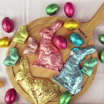 chocolate easter bunnies wrapped in blue gold and pink foil