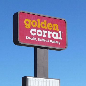 the sign towering over the golden corral parking lot in rock springs, wyoming