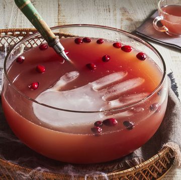 witch's brew punch with ice hands