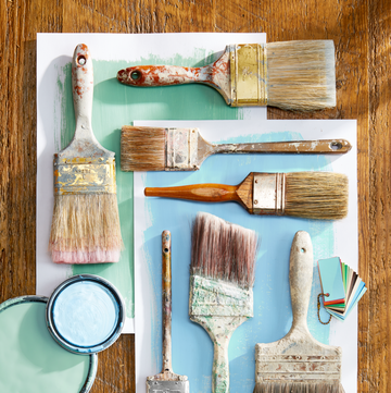 vintage paint brushes and paint can lids
